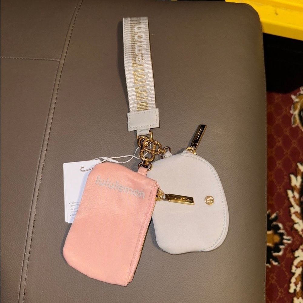 lululemon dual pouch wristlet pink /gold